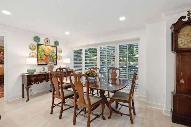 4242 Lomo Alto Dr Unit N12, Highland Park, TX 75219 - dining space featuring light wood-style floors, recessed lighting, and ornamental molding