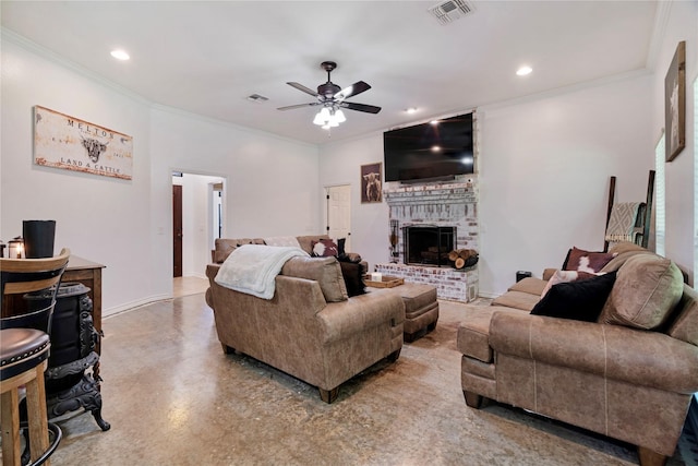 living area with recessed lighting, visible vents, a ceiling fan, crown molding, and a brick fireplace