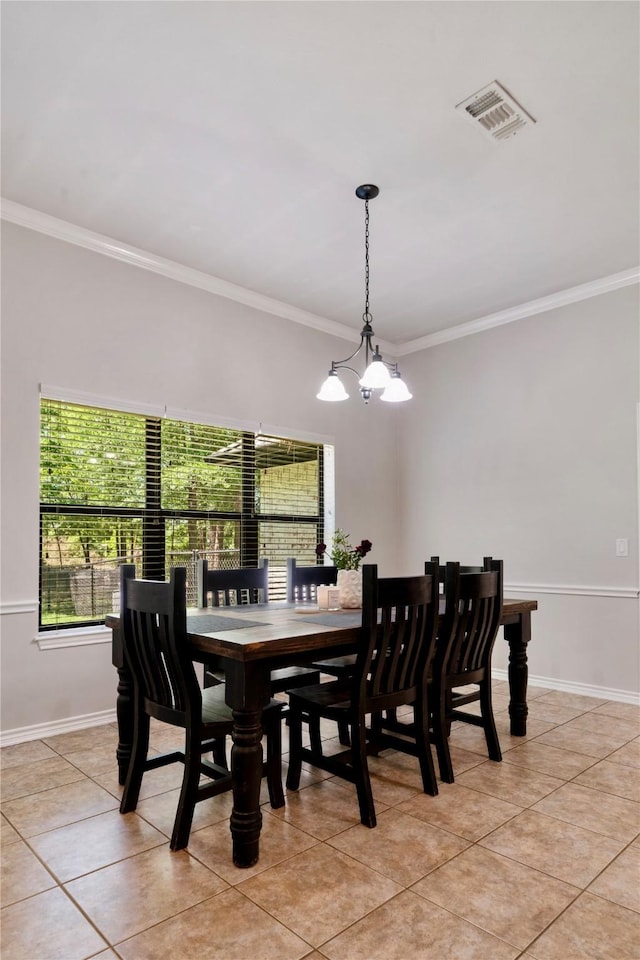 dining space with a wealth of natural light, crown molding, visible vents, and light tile patterned floors