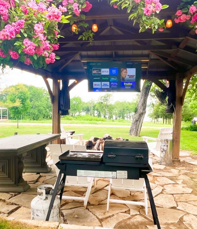 view of home's community featuring a gazebo and a yard