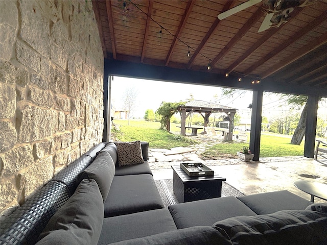 view of patio with a gazebo and outdoor lounge area