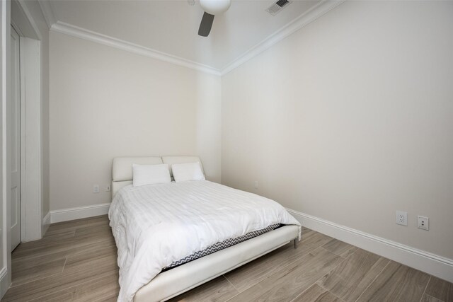 walk in closet with visible vents and light wood finished floors