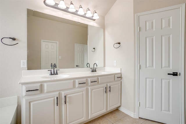 bathroom featuring a sink, tile patterned floors, and double vanity