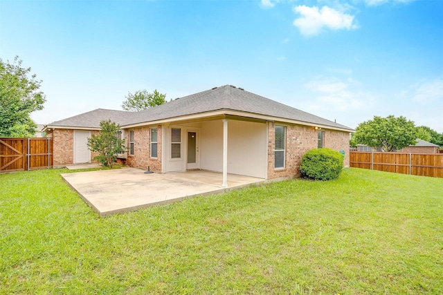601 Mcneill Ln, Saginaw, TX 76179 - back of house featuring a patio, a fenced backyard, and brick siding