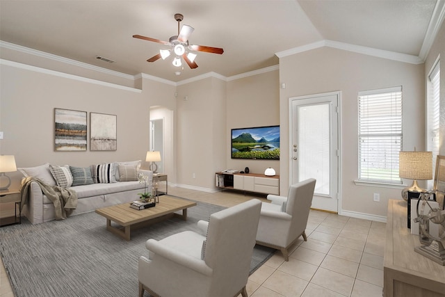 601 Mcneill Ln, Saginaw, TX 76179 - living room featuring light tile patterned flooring, ceiling fan, arched walkways, and ornamental molding