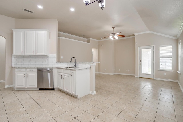 kitchen with visible vents, light tile patterned flooring, ceiling fan, a sink, and dishwasher