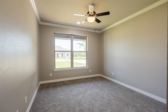 unfurnished room featuring ceiling fan, baseboards, carpet floors, and ornamental molding