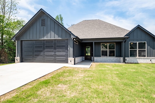 view of front of home featuring roof with shingles, driveway, board and batten siding, and a garage