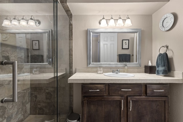 full bathroom featuring vanity and a stall shower