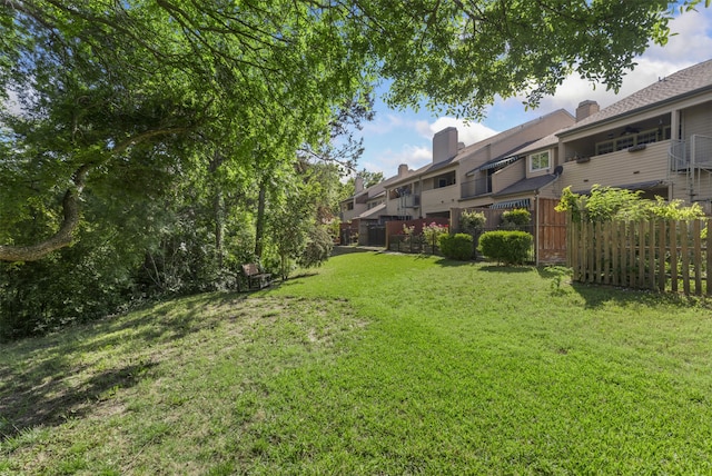 view of yard with fence