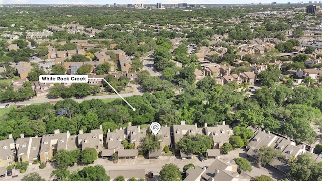 birds eye view of property with a residential view