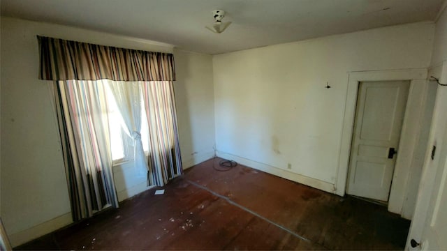 unfurnished dining area with baseboards