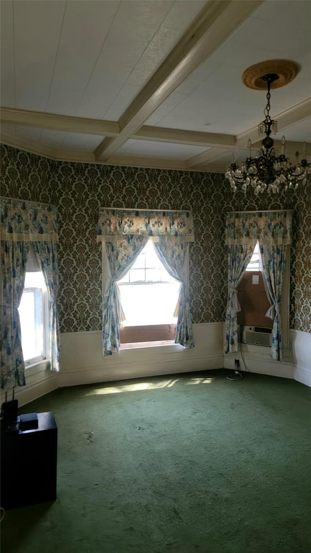 additional living space with wallpapered walls, carpet, beam ceiling, and a wainscoted wall