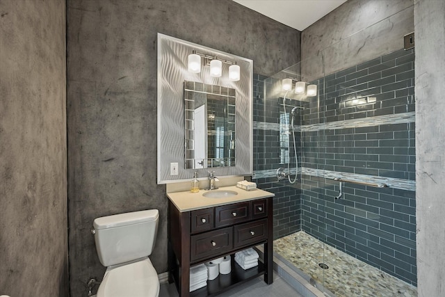 992 Anna Cade Rd, Rockwall, TX 75087 - bathroom featuring a tile shower, toilet, and vanity