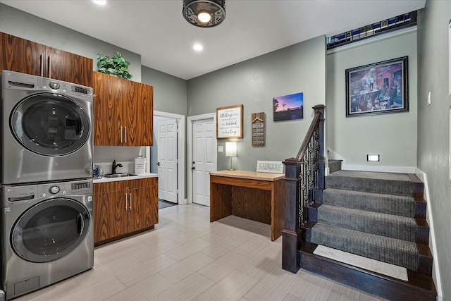 992 Anna Cade Rd, Rockwall, TX 75087 - washroom with cabinet space, stacked washer / dryer, and recessed lighting