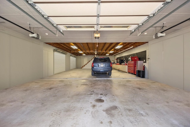 992 Anna Cade Rd, Rockwall, TX 75087 - garage featuring a garage door opener
