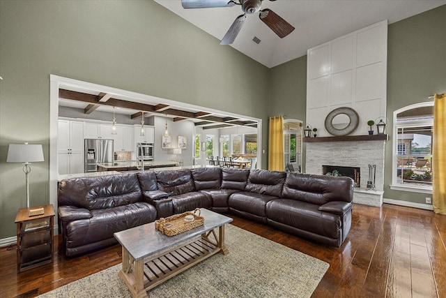 992 Anna Cade Rd, Rockwall, TX 75087 - living room with dark wood-style flooring, a ceiling fan, coffered ceiling, baseboards, and a large fireplace