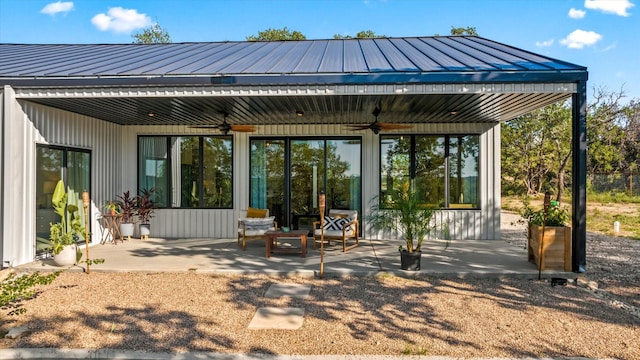 195 Lookout Pt, Stephenville, TX 76401 - back of property with a ceiling fan, a patio, and metal roof