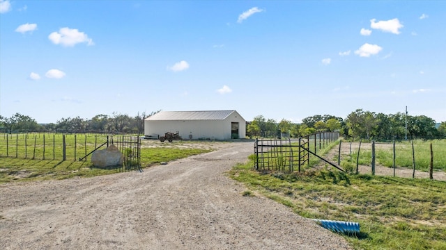 195 Lookout Pt, Stephenville, TX 76401 - view of front of house featuring a rural view, an outbuilding, and an outdoor structure