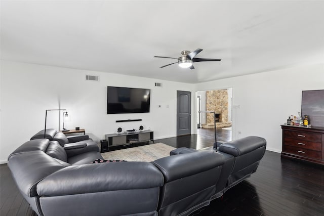 2222 Ravenwood Dr, Grand Prairie, TX 75050 - living area featuring a ceiling fan, dark wood-style floors, and baseboards