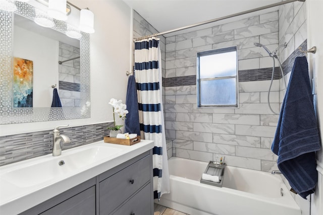 2222 Ravenwood Dr, Grand Prairie, TX 75050 - bathroom with shower / tub combo, vanity, and backsplash