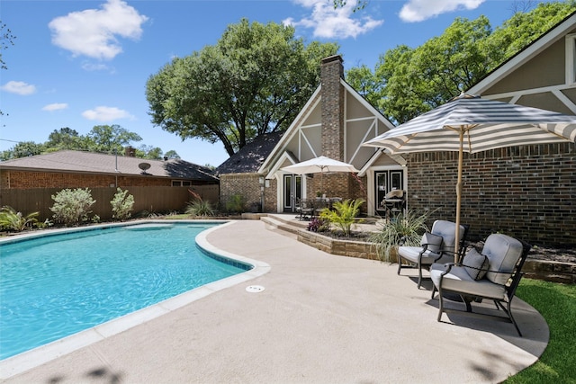 2222 Ravenwood Dr, Grand Prairie, TX 75050 - view of pool with a patio area