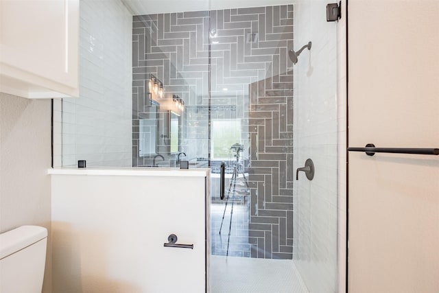 14835 Fallow Ln, Tyler, TX 75706 - full bathroom featuring toilet and a stall shower