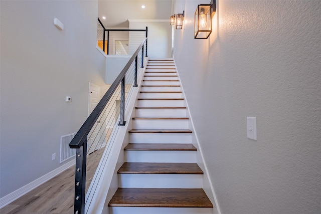 14835 Fallow Ln, Tyler, TX 75706 - stairs featuring recessed lighting, wood finished floors, visible vents, crown molding, and baseboards
