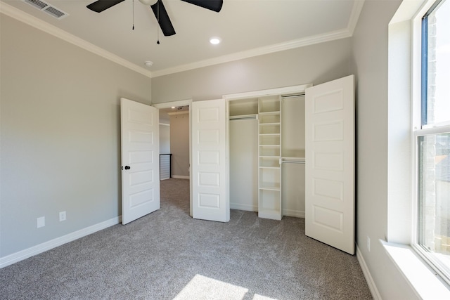 14835 Fallow Ln, Tyler, TX 75706 - unfurnished bedroom with a closet, carpet flooring, visible vents, and crown molding