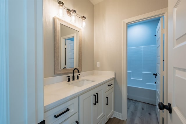 14835 Fallow Ln, Tyler, TX 75706 - full bathroom featuring vanity, wood finished floors, and  shower combination