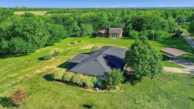 bird's eye view with a view of trees