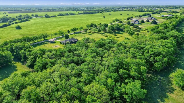 birds eye view of property featuring a rural view