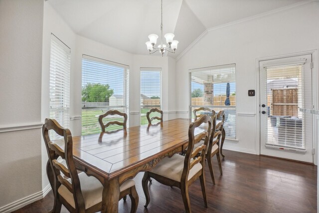 dining area with an inviting chandelier, crown molding, lofted ceiling, baseboards, and dark wood-type flooring