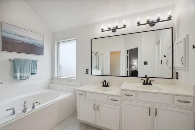 full bath with double vanity, a shower with door, a sink, and a bath