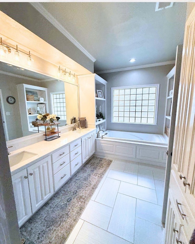 full bath with crown molding, a sink, a garden tub, and double vanity