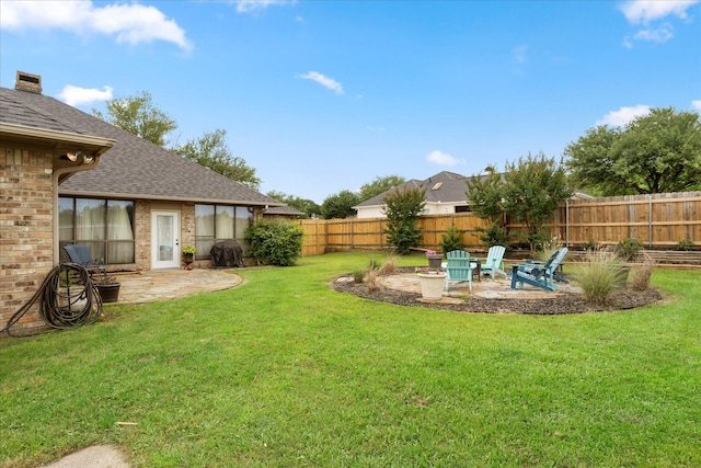view of yard featuring a fenced backyard and a patio area