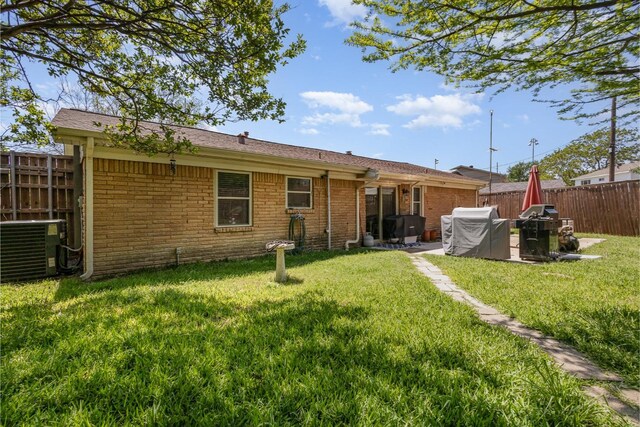 view of patio / terrace with area for grilling and fence