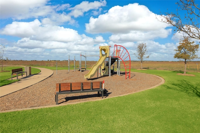 community playground with a lawn