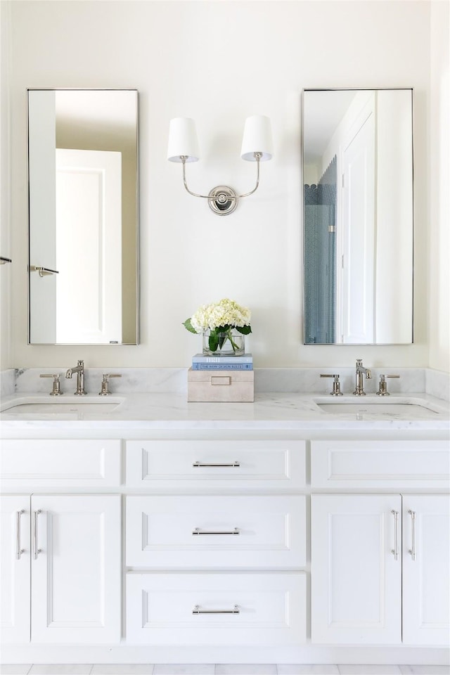 7206 Northaven Rd, Dallas, TX 75230 - bathroom featuring double vanity and a sink