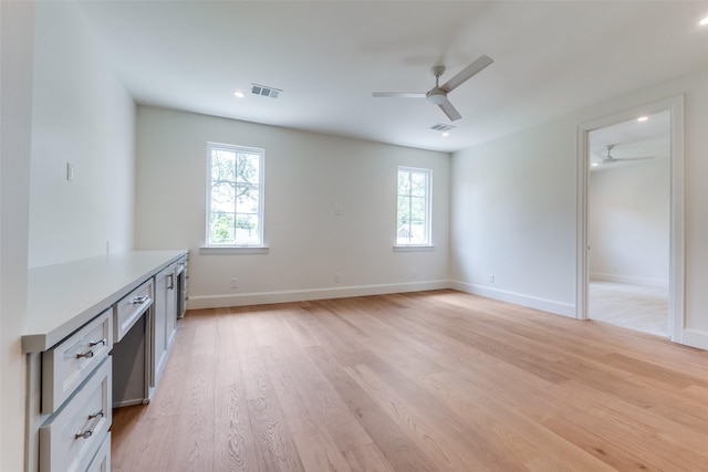 7206 Northaven Rd, Dallas, TX 75230 - interior space featuring light wood-type flooring, baseboards, visible vents, and ceiling fan