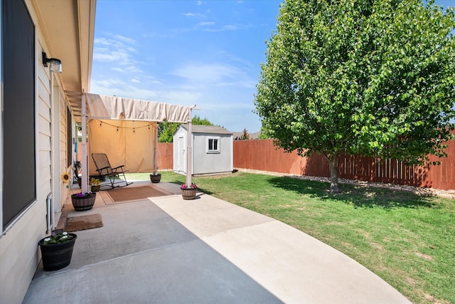 view of patio / terrace featuring a storage shed, a fenced backyard, and an outdoor structure
