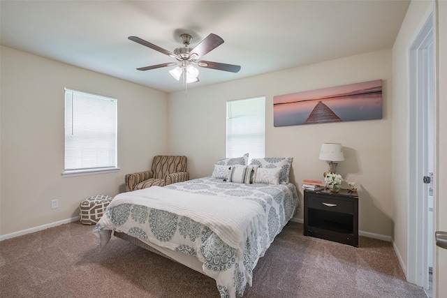 carpeted bedroom with baseboards and ceiling fan