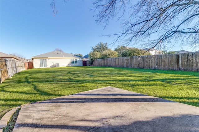 view of yard featuring a fenced backyard and a patio area