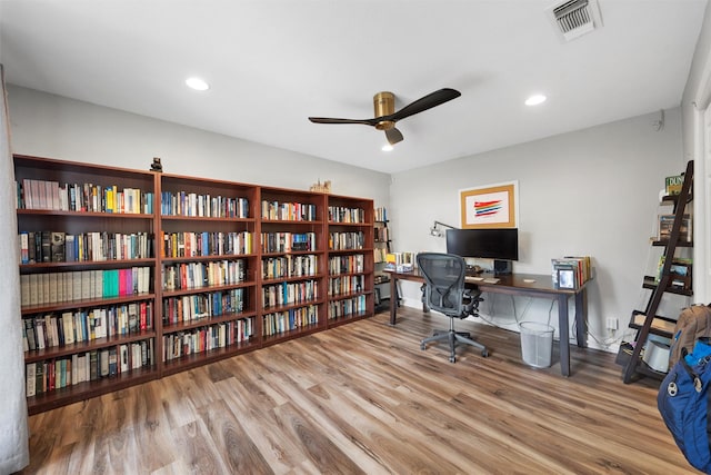 office area featuring a ceiling fan, wood finished floors, visible vents, and recessed lighting