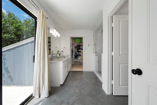 hallway with dark tile patterned flooring