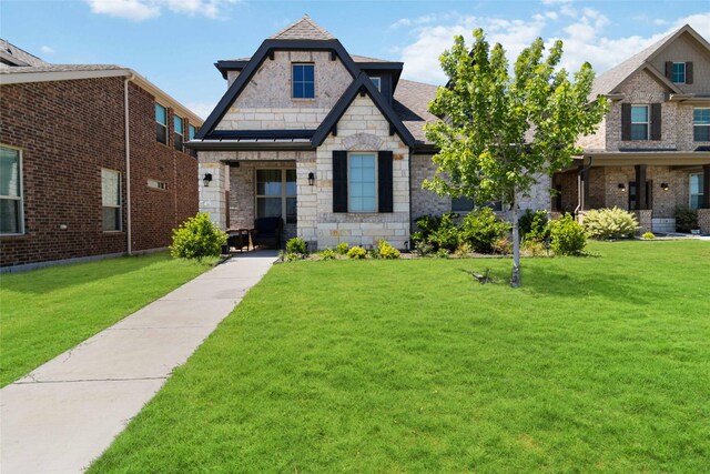 1313 Canuela Way, Justin, TX 76247 - craftsman house featuring stone siding and a front yard