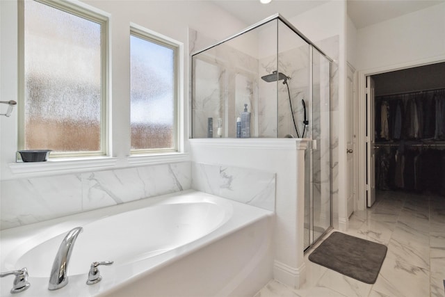 1313 Canuela Way, Justin, TX 76247 - full bath featuring a bath, a spacious closet, marble finish floor, and a marble finish shower