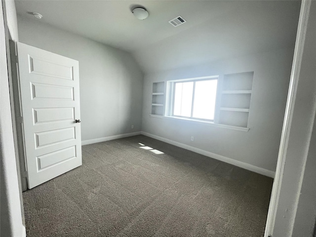 6109 Rodin Dr, Royse City, TX 75189 - interior space featuring baseboards, vaulted ceiling, visible vents, and carpet