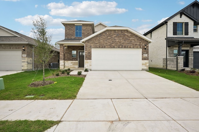 4012 Sandstone Dr, Mckinney, TX 75071 - craftsman-style home with a front yard, a garage, concrete driveway, central air condition unit, and stone siding