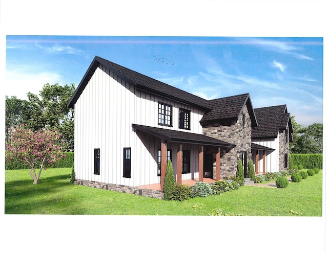 view of front of home featuring stone siding, board and batten siding, and a front yard
